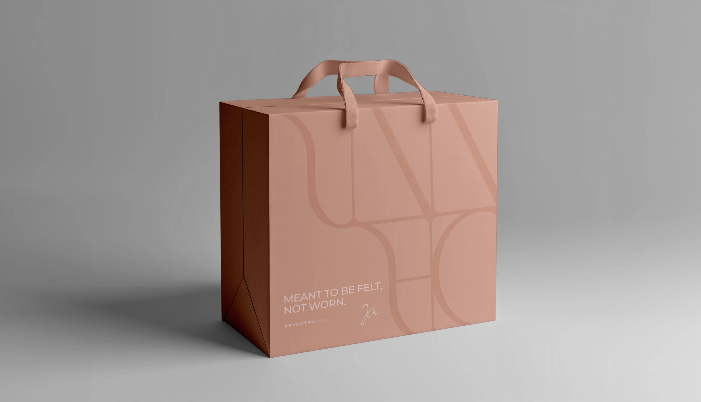 Pale pink Joanna Achkar shopping bag with an oversized line monogram